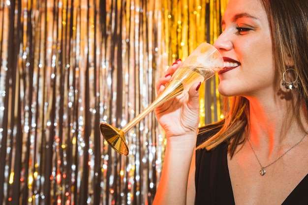 New Year Celebrations with a Woman Drinking – Free Download