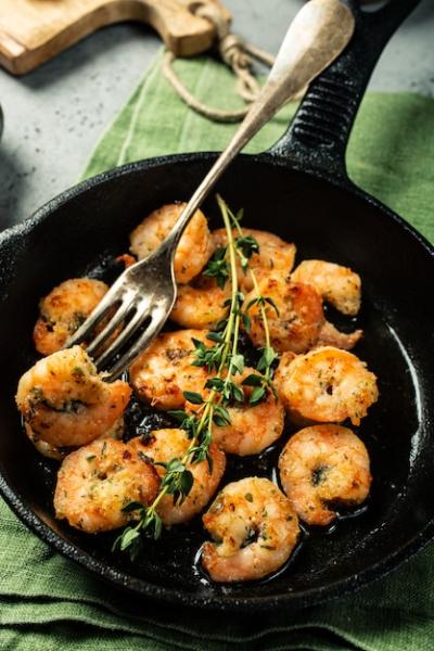 Shrimps Roasted on a Cast Iron Pan – Free Download Stock Photo