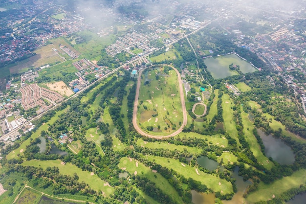 Aerial View of Chiang Mai, Thailand: Scenic Golf Course Photo – Free Download