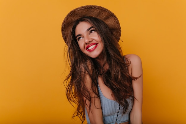 Dreamy Portrait of an Easygoing Brunette Woman in Yellow – Free Download