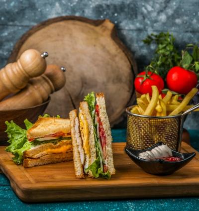 Delicious Club Sandwich with Fries, Mayonnaise, and Ketchup – Free Download