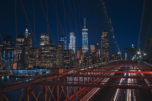 Nighttime Cityscape of New York from Brooklyn Bridge – Free Download