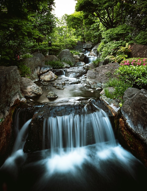 Discover a Beautiful Small Waterfall in a Mountain River – Free Download