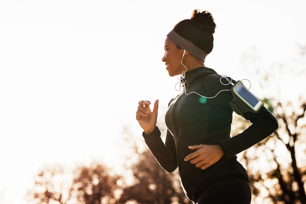 Joyful African American Woman Running in the Park â Free Stock Photo for Download