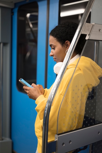 People Traveling on the Subway in Winter Time – Free Download