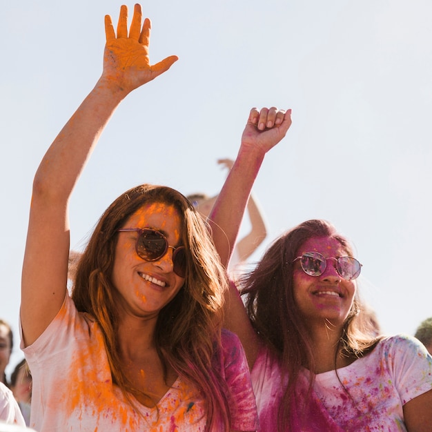 Young Women Dancing with Holi Color on Their Faces – Free Stock Photo, Download for Free