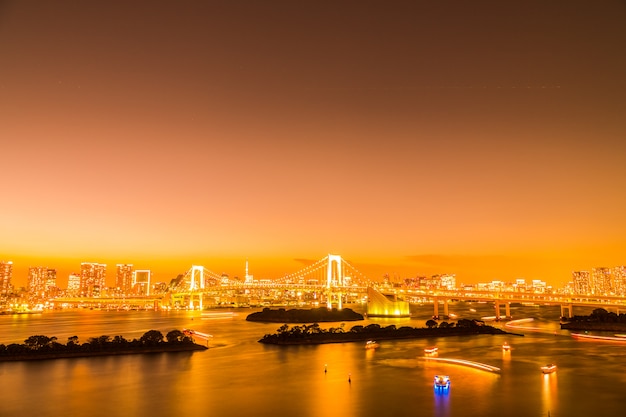 Tokyo Cityscape Featuring the Iconic Rainbow Bridge – Free Download