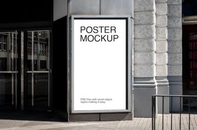 Posters in Front of Building Pillars – Free Stock Photo for Download