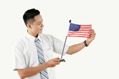 Asian Man Holding American Flag – Free Stock Photo for Download