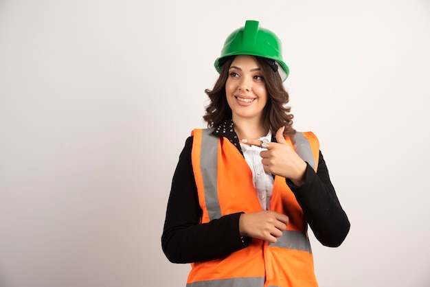 Industrial Worker Woman Pointing – Free Download Stock Photo