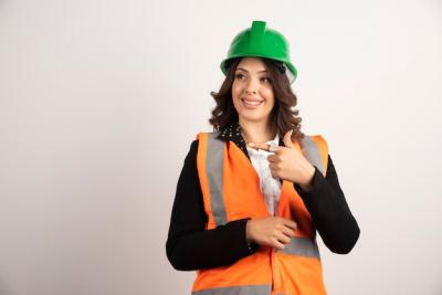 Industrial Worker Woman Pointing – Free Download Stock Photo