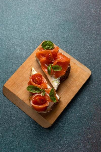 Wooden Cutting Board with Sandwich and Tomatoes – Free Download