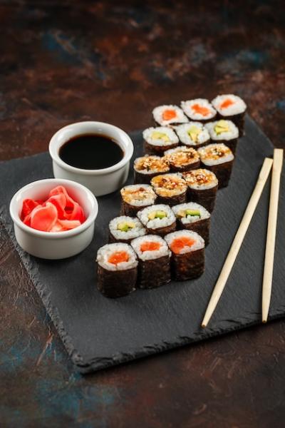 Delicious Japanese Sushi on Rustic Dark Background – Free Stock Photo Download