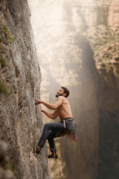 Strong Man Climbing a Mountain – Free Stock Photo, Download for Free