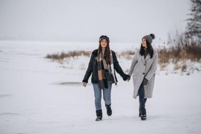 Two Girls Walking Together in a Winter Park – Free Stock Photo for Download