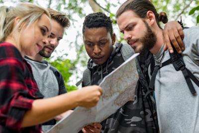 Friends Navigating Directions on a Map – Free Stock Photo, Download for Free