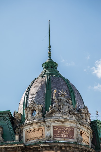 Old Building Roof Against a Clear Blue Sky – Free Download