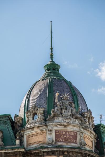 Old Building Roof Against a Clear Blue Sky – Free Download