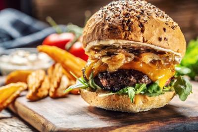 Delicious Hamburger with Caramelized Onion, Arugula, and Melted Cheese – Free Stock Photo for Download