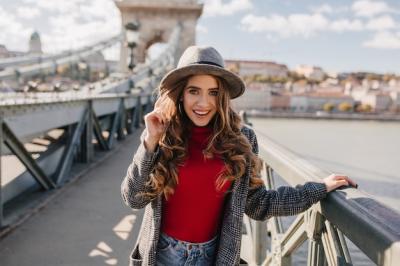 White Female Model in Hat Posing by River – Free Stock Photo, Download for Free