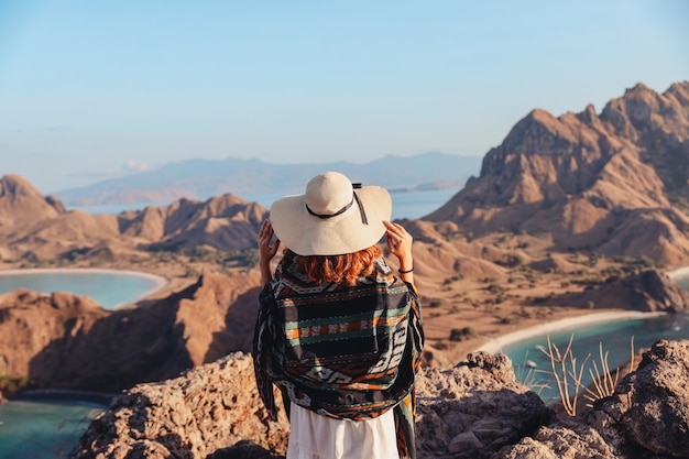 Woman in Summer Hat and White Dress Enjoying Scenic Sea View – Free Stock Photo Download