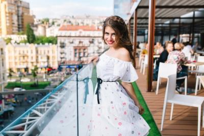 Beautiful Girl Posing on Cafe Terrace in a White Dress – Free Stock Photo, Download Free