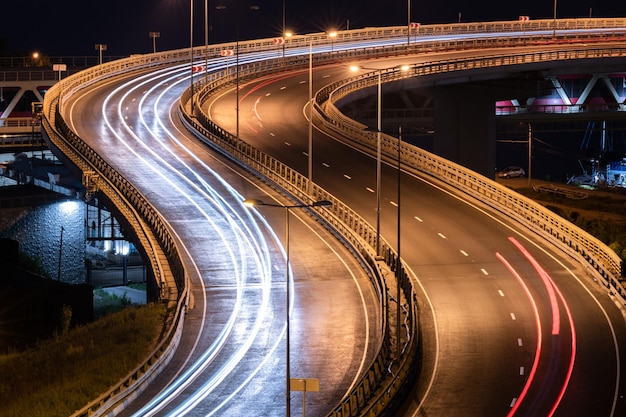 High Angle View of Light Trails on Highway at Night – Free Download