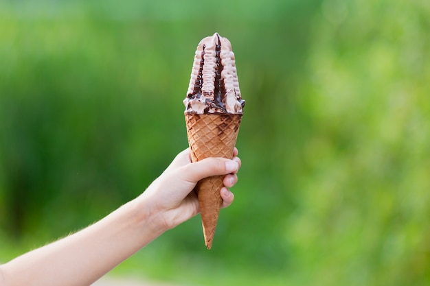 Girl Holding Delicious Chocolate and Syrup Ice Cream – Free Download