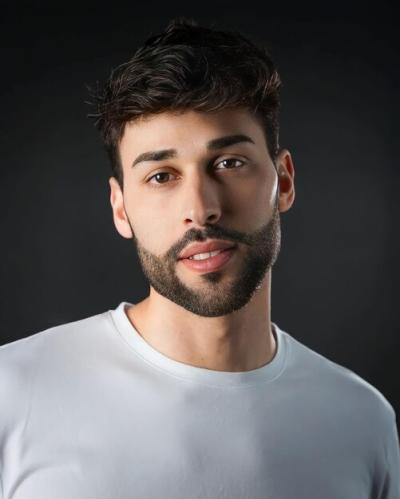 Portrait of a Man Looking at the Camera – Free Download