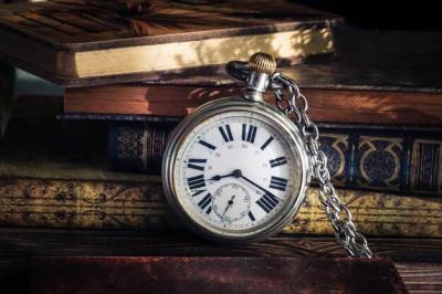 Close-up of Pocket Watch with Books – Free Stock Photo for Download