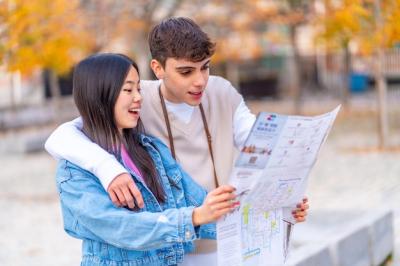 Multiethnic Young Couple Exploring Outdoors – Free Stock Photo for Download