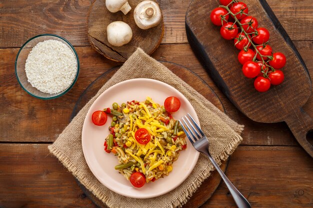 Delicious Risotto with Mushrooms and Cheese on a Wooden Background – Free Download