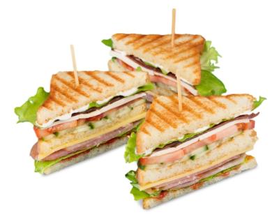 Delicious Freshly Made Club Sandwiches on a Wooden Chopping Board – Free Download