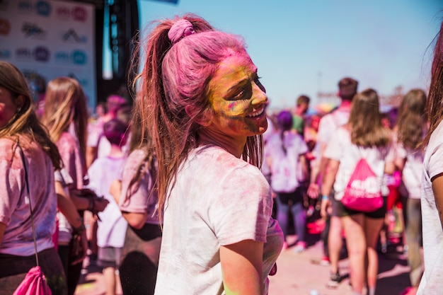 Close-up of Woman Covered with Holi Powder – Free Download