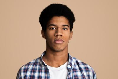 Sophisticated Portrait of an African American Teen Looking at the Camera – Free Download