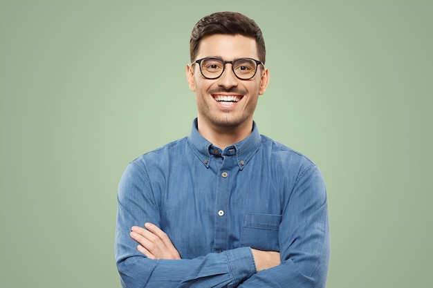 Businessman in Blue Shirt and Glasses with Arms Crossed – Free Stock Photo for Download