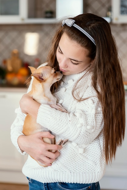 Girl at Home with Dog – Free Stock Photo for Download