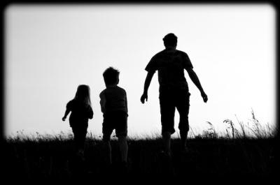 A Happy Family Enjoying Nature with Contoured Lighting – Free Download