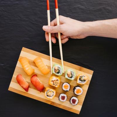 Hand Picking Rolls from Board – Free Stock Photo, Download Free