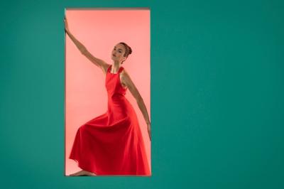 Beautiful Woman Posing in Flowing Red Dress – Free Stock Photo for Download