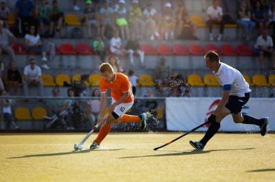 Field Hockey Players in Action During Tournament Game – Free Download