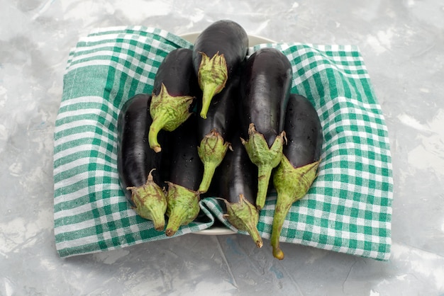 Fresh Raw Eggplants on a White Background – Free Stock Photo for Download