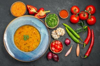 Top View of Lentil Soup Surrounded by Colorful Vegetables – Free to Download