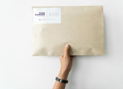 Package Mockup Held by Woman – Free Download