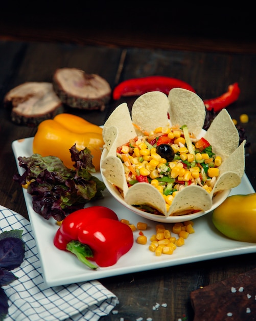 Colorful Vegetable Salad with Corn Seeds, Bell Peppers, Herbs, and Chips – Free Stock Photo for Download