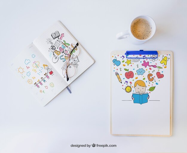 Colorful Drawings on Clipboard and Notebook – Free Download