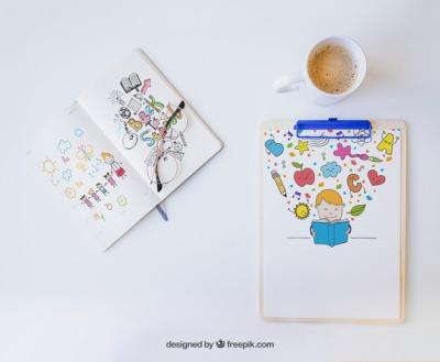 Colorful Drawings on Clipboard and Notebook – Free Download