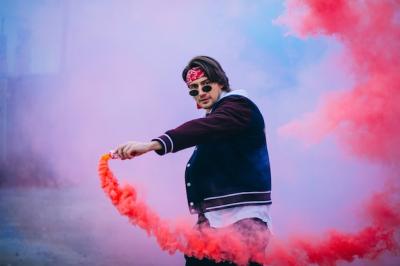 Male Urban Dancer Surrounded by Colored Smoke – Free to Download