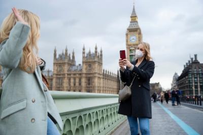 Tourists Exploring the City in Travel Masks – Free Download