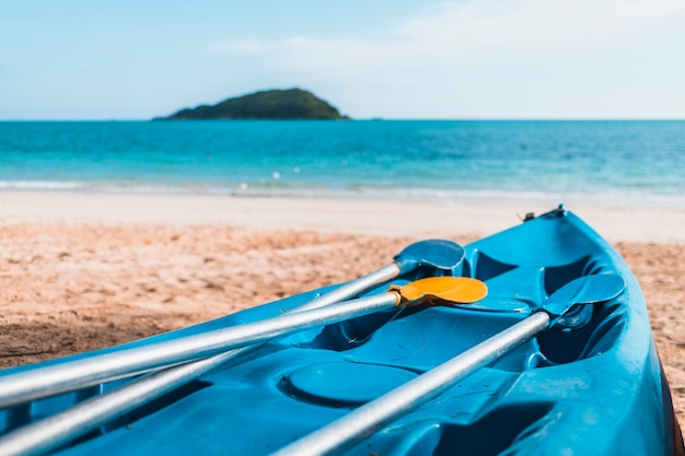 Blue Kayak on Sandy Seashore – Free to Download